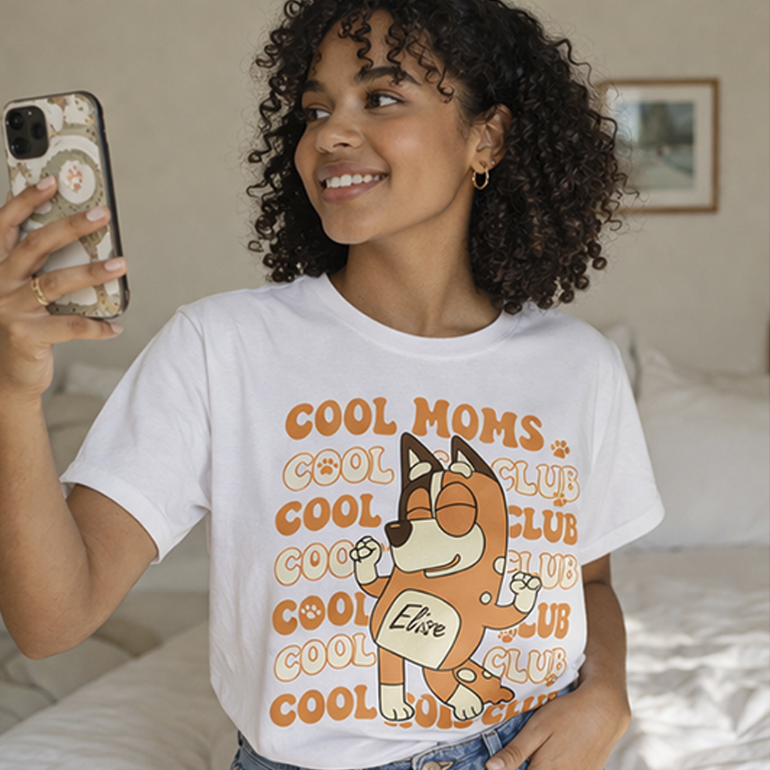 Personalized White Cool Moms Club Shirt on Model, Custom Pet Name Elise Graphic Tee, Retro Aesthetic Dog Mom Gift, Bluey Style T-shirt for Women, High Quality Cotton Apparel, TrioAuraDesign.