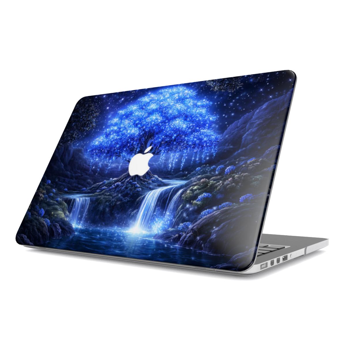 An angled profile view of a MacBook featuring a protective hardshell case with a 3D-effect design of a magical glowing blue willow tree and ethereal waterfalls against a starry night sky, with a white Apple logo visible in the center.