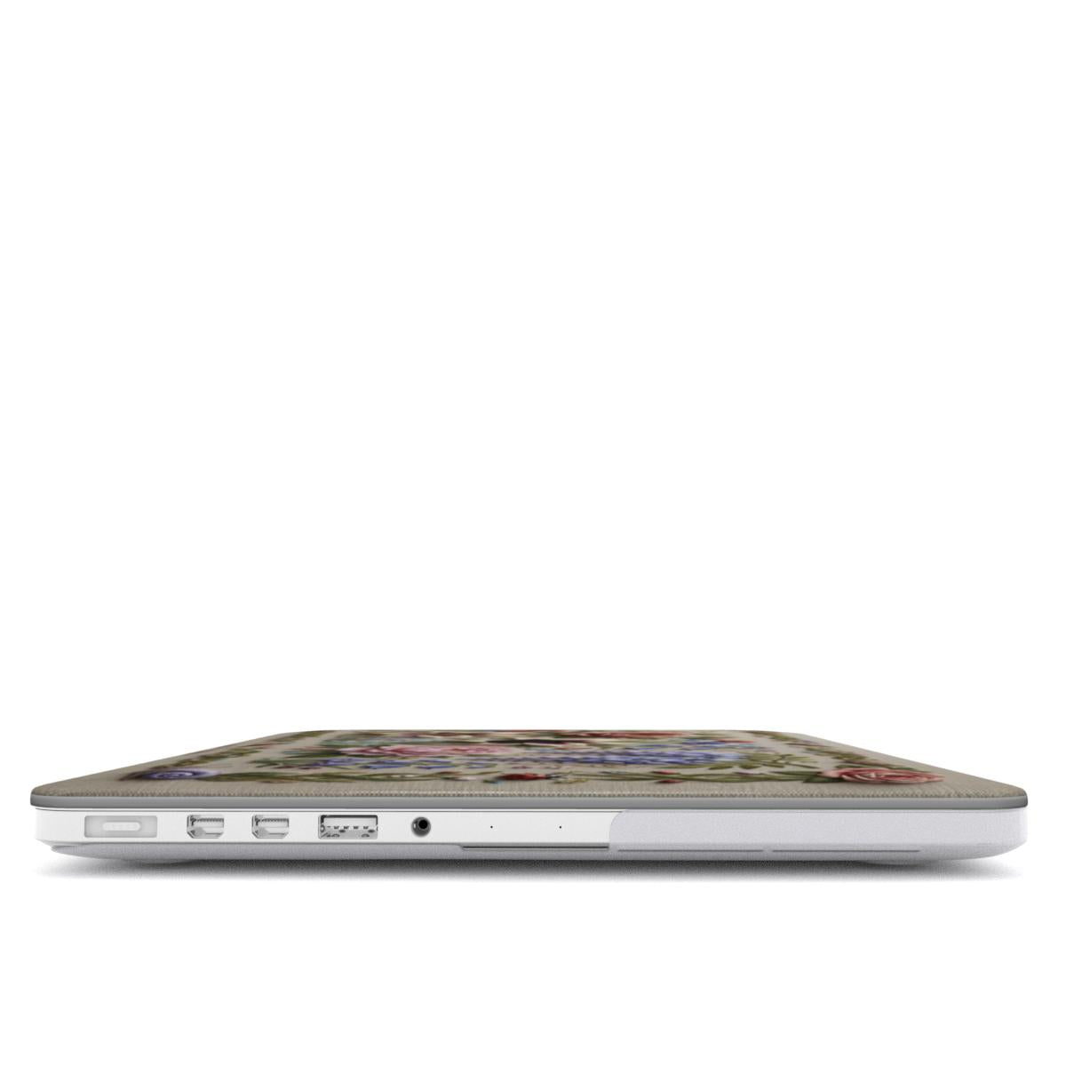Side view of a closed laptop in a protective hard shell case featuring a vintage floral print. The top cover displays an intricate pattern of roses and wildflowers on a beige linen-textured background. The case is precision-cut, ensuring all side ports like USB and the audio jack remain fully accessible.