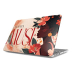 A personalized MacBook case on a white background, featuring a vibrant illustration of a Black woman with coral flowers, custom typography "SOPHIA MUSE," and a warm neutral background with the Apple logo.