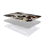 An exploded view of a protective case kit for a MacBook, showing the top printed retro collage shell, the silver laptop, and a clear vented bottom cover with rubber feet, set against a clean white background.