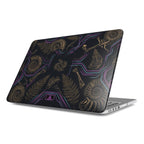 Lifestyle photo of a MacBook on a wooden desk featuring a premium hard shell case with a glossy finish. The paleo-futuristic design showcases a stunning 3D visual effect, combining golden ancient fossils and ferns with glowing neon purple and cyan cyber-lines against a deep black background, reflecting light for a high-end look.