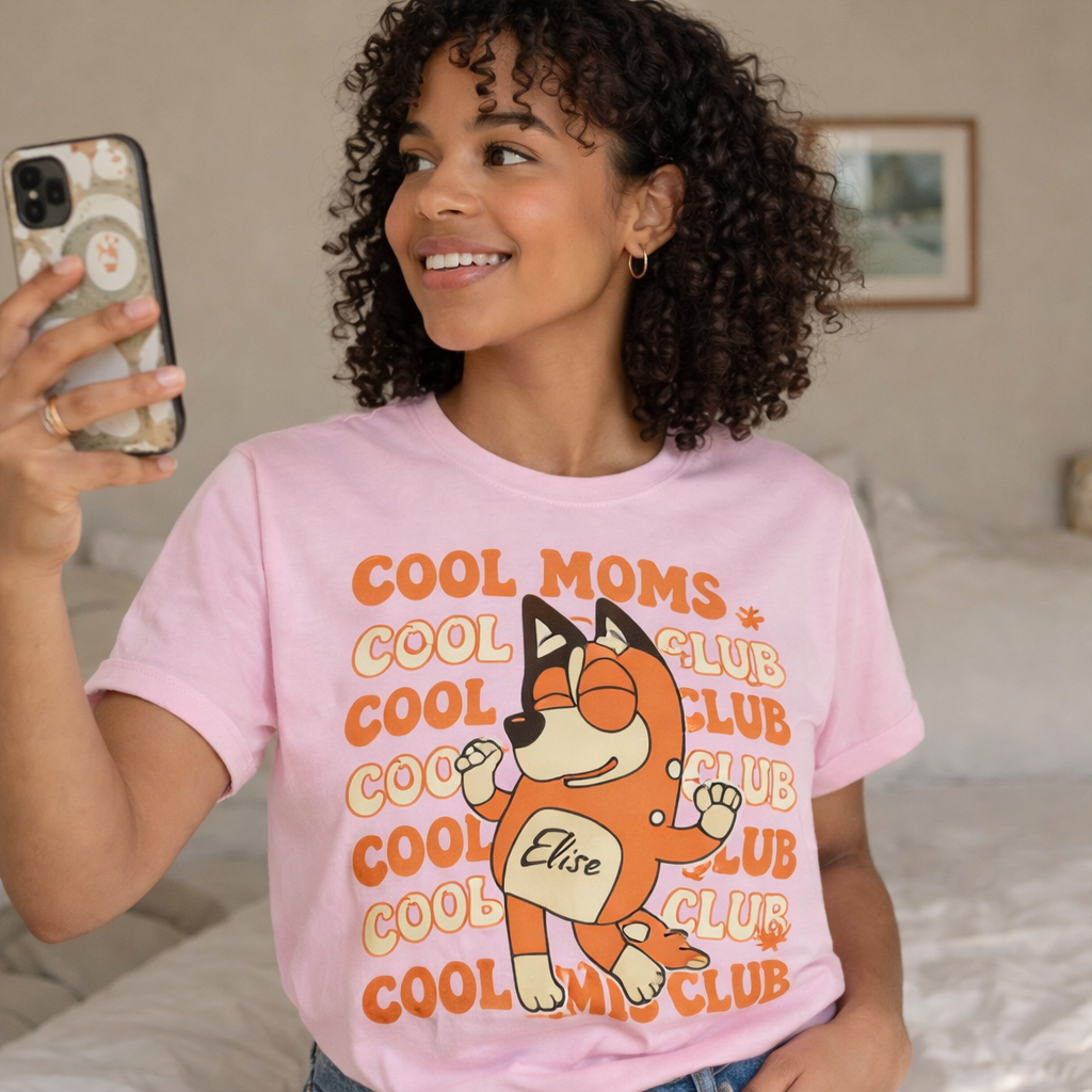 Personalized Pink Dog Mom Shirt on Model, Custom Cool Moms Club Apparel with Pet Name Elise, Retro Light Pink T-shirt, Bluey Inspired Gift for Dog Owners, Aesthetic Personalized Mother's Day Tee, TrioAuraDesign.