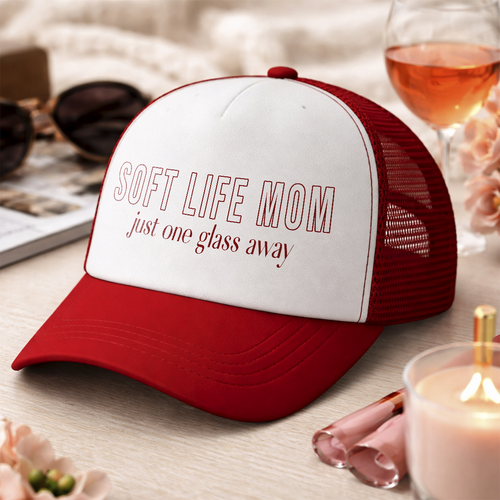 Red and white "Soft Life Mom" trucker hat, a perfect Mother's Day gift for her. Stylish vintage-style accessory present by TrioAuraDesign.