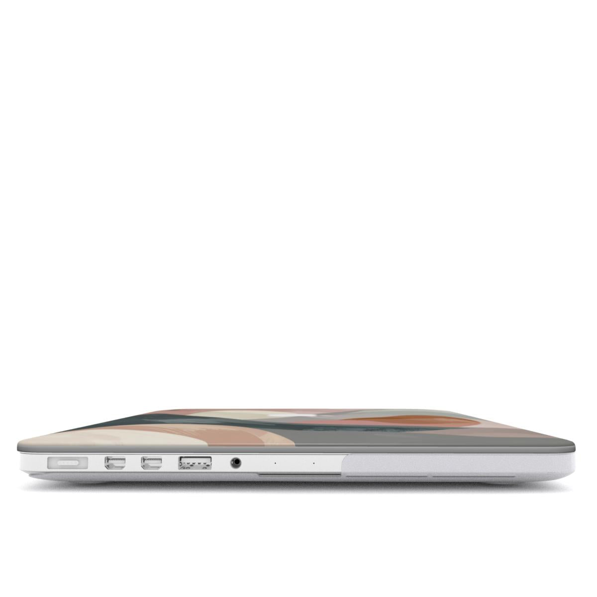 Side view of a MacBook featuring a personalized soft neutral abstract case with the monogram O.H., showcasing the slim-fit design and precision cutouts for all ports and connectors.