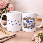 Woman holding a personalized "Mom Fuel" ceramic mug with vibrant watercolor blueberry desserts and custom children's names printed on the front.