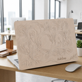 Open MacBook with a beige botanical hard shell case personalized with the name Adelina, full cover style, on an office desk. Printed design, smooth matte finish.