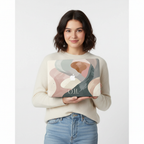 A young woman stands holding a MacBook case featuring a muted pink, sage green, and beige abstract art design with the white monogram O.H. centered at the bottom, on a plain white background.