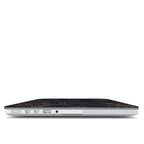 Close-up profile view of the left side of a MacBook, focusing on the ports and the slim fit of the protective hardshell case. The very bottom of the lid cover shows the edge of the paleo-futuristic design with a glowing neon cyan and purple line.