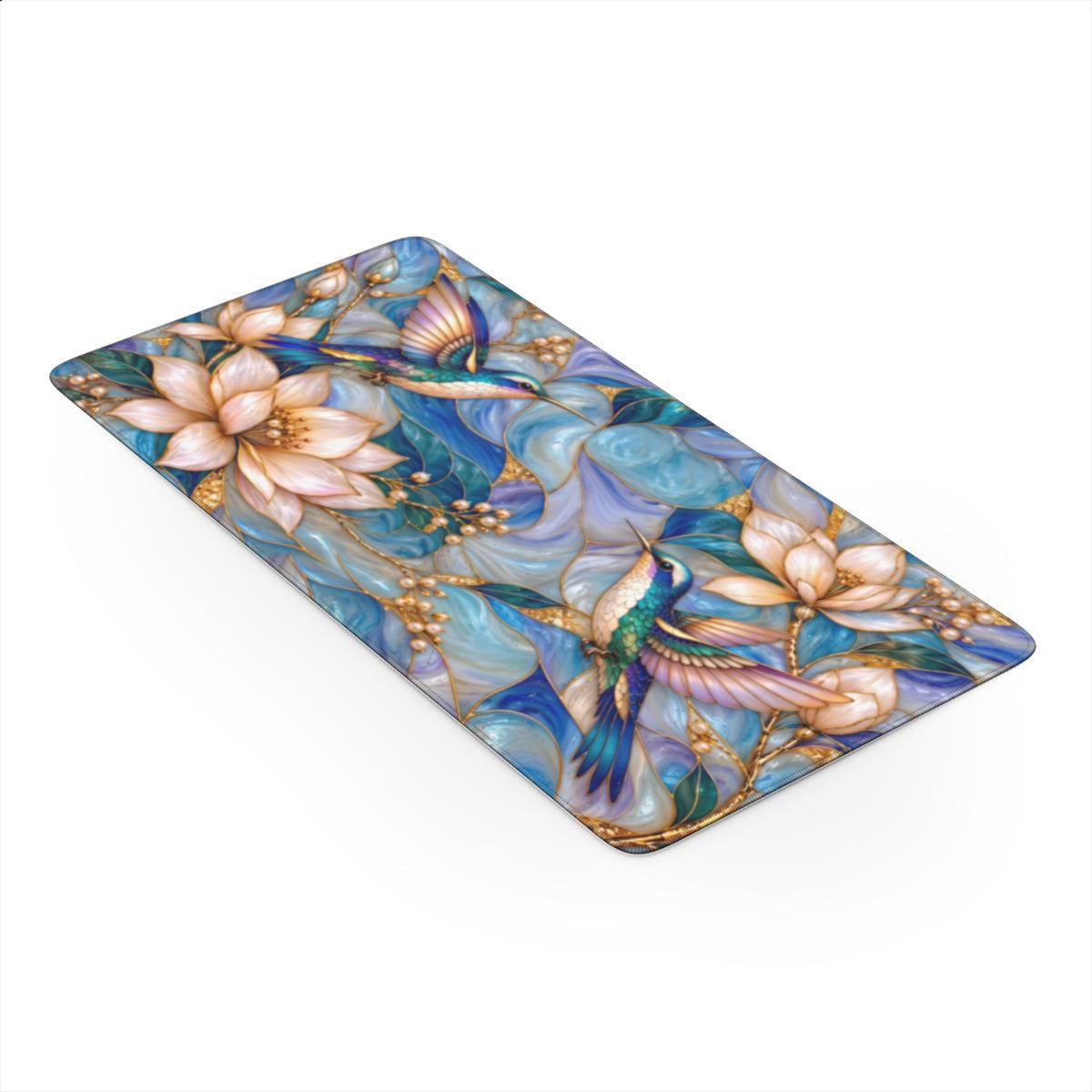 Hummingbird desk mat on a white background, angled view of the full printed design with stitched edges.