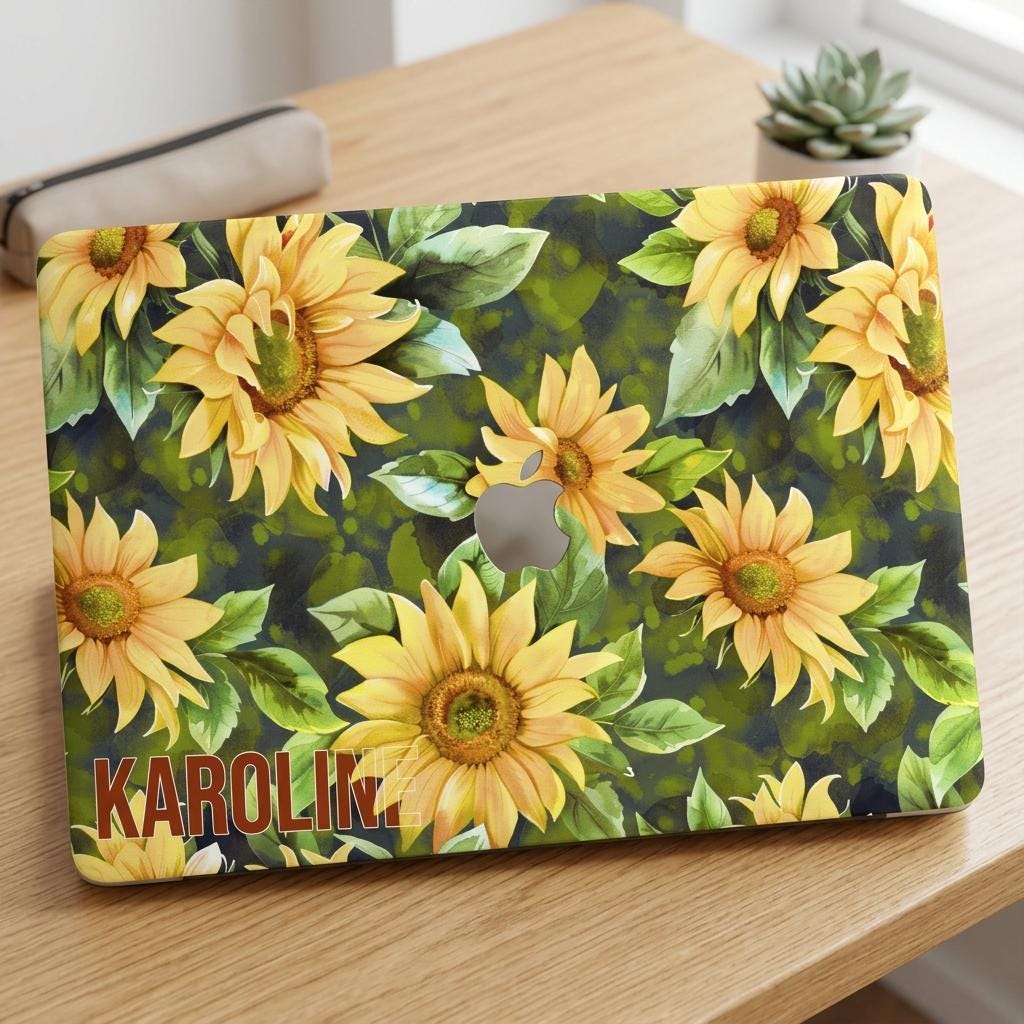 Custom name Karolina sunflower MacBook case on wooden desk with succulent, personalized bold yellow floral hard shell laptop cover