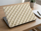 Personalized quilted MacBook case with gold monogram initial on wooden desk, beige diamond pattern laptop cover with pearl studs for MacBook Air and Pro