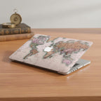 Vintage world map MacBook case on wooden surface with compass and old books, antique cartographic hard shell laptop cover travel aesthetic