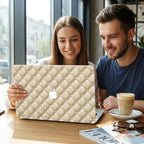 Couple in cafe with personalized quilted MacBook case custom name Luisi, luxury pearl diamond pattern laptop cover in cream champagne tones