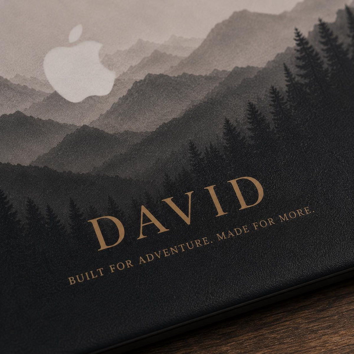 Close-up of the personalized name on a custom mountain MacBook case by TrioAura Design. Detailed UV print on a slim hard shell MacBook Air and MacBook Pro case with crisp lettering and premium finish.
