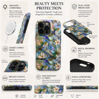 Product infographic showcasing a stained glass effect MagSafe-compatible iPhone case featuring vibrant hummingbirds,white lilies,and botanical artwork in rich blue,teal, ivory, and gold tones. The infographic highlights dual-layer protection, shock-absorbing TPU inner liner, hard polycarbonate shell, raised camera bezel, precise cutouts, UV fade-resistant printing, slim ergonomic design, and built-in MagSafe compatibility. Smooth glossy printed stained glass effect. Available from TrioAuraDesign