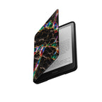 Jewel Tone black marble Kindle cover opened over Kindle Paperwhite screen, gold kintsugi effect with emerald, sapphire and ruby opal tones