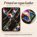 Close-up of printed marble and gold effect on black marble Kindle case, printed on vegan leather, stone and gold details are printed